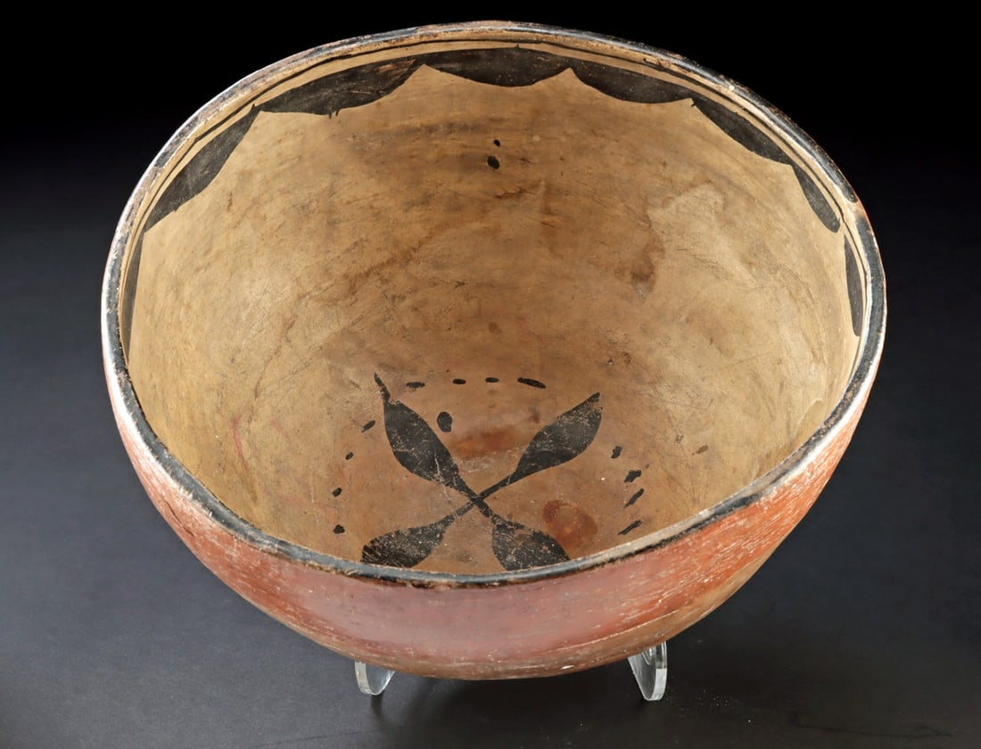 Santo Domingo Pueblo) Bowl - Black Cloud-Band Rim, Rain Motifs: Southwestern United States, Kewa (Santo Domingo) Pueblo. Ca. 1900–1920 CE. A large hand-coiled earthenware serving bowl whose warm red exterior contrasts with a cream-slipped interior animated b