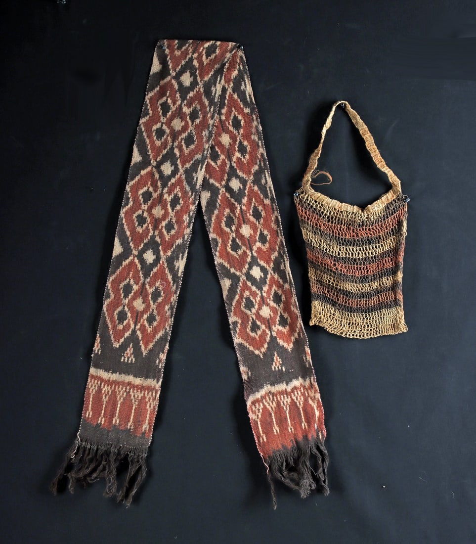 Indonesian Ikat Sash & Papua New Guinea Bilum Bag - Textile Pair: Southeast Asia, Indonesia; and Melanesia, Papua New Guinea, ca. 1900–1975 CE. Two textiles comprising an Indonesian ikat sash and a Papua New Guinea bilum bag. The cotton sash is warp ikat, resi