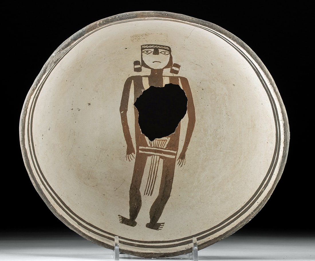 Mimbres Black-on-White Pottery Bowl - Standing Woman, Kill Hole: Native American, Southwestern United States, New Mexico, Mimbres Valley. Ca. 951–1200 CE. A rare and important hemispherical black-on-white pottery bowl featuring a finely painted figural compos
