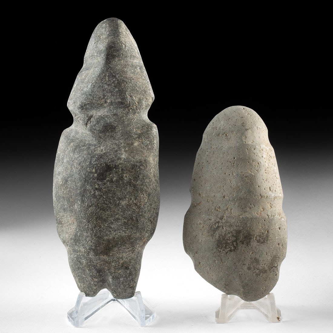 Two Guerrero Mezcala Stone Axe God Figures: Pre-Columbian, Mexico, Guerrero, Mezcala, ca. 500–100 BCE. A pair of anthropomorphic figures carved from dense volcanic stone in the pared-down idiom for which the Mezcala culture of Guerrero is
