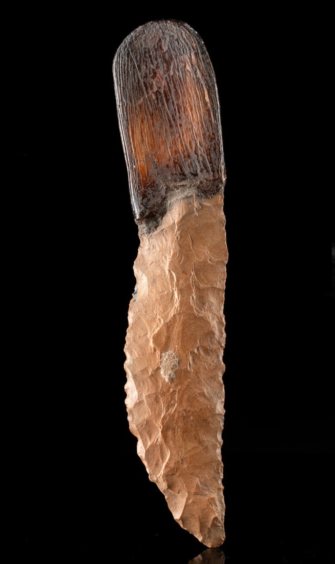 Egyptian Predynastic Chert Knife w/ Hippo Tooth Handle: Ca. 3310–3000 BCE. Ancient Egypt, Predynastic Period, Naqada III, ca. 3310 to 3000 BCE. A rare bifacial chert knife with a tapered, finely knapped blade and a fitted organic handle, likely hippo