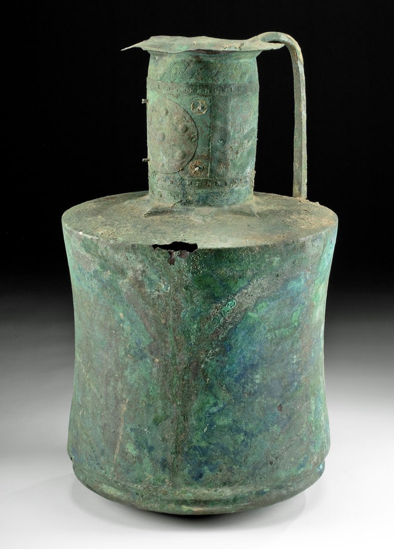 Huge 10th C. Islamic Nishapur Copper Ewer: Ca. 900–1300 CE. Medieval Near East / Western Asia, Persia (Iran), Nishapur area, Islamic culture, ca. late 10th to early 13th century CE. A superb and quite sizable copper ewer featuring a uniq