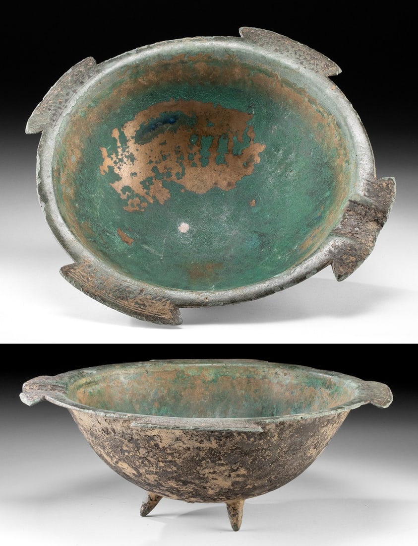 Islamic Bronze Incense Tripod, Kufic Inscriptions: Ca. 900–1300 CE. Central Asia, Afghanistan, Turkmenistan or Iran, ca. 10th to 13th century CE. Cast in bronze, this hemispherical bowl rests on three short, triangular-section feet and is surmou