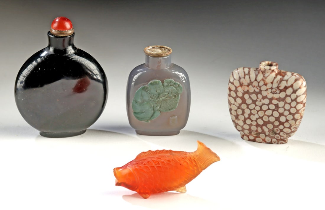 Four 18th C. Chinese Qing Stone & Glass Snuff Bottles: Ca. 1720–1730 CE. East Asia, China, Qing Dynasty, 18th to 19th century CE. A compact survey of Qing ingenuity and taste, this group of four snuff bottles captures the playful intellect and tacti