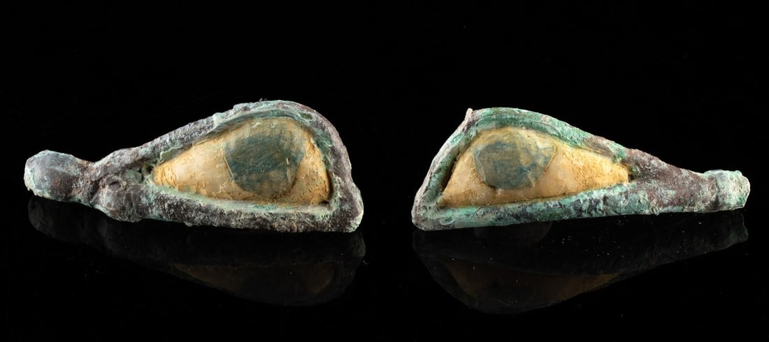 Egyptian Late Period Bronze Eyes w/ Glass & Stone Inlay: Ca. 664–332 BCE. Egypt, Late Dynastic Period, 26th to 30th Dynasties, ca. 664 to 332 BCE. A compelling pair of ritual eyes, these leaded bronze fittings once animated a mummy mask, restoring ete