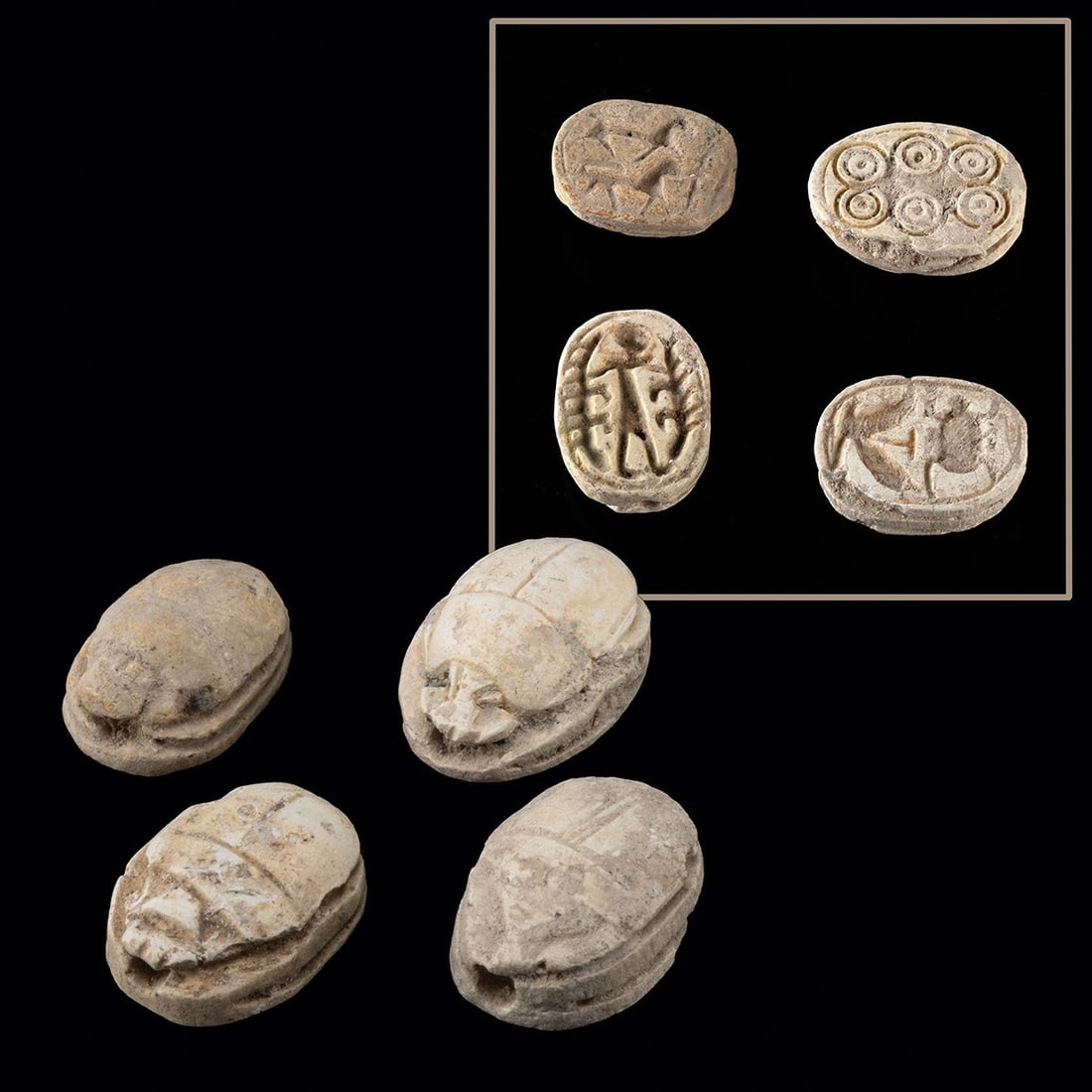 4 Egyptian Faience Scarab Amulets - Middle Kingdom to Third Intermediate: Egypt, Middle Kingdom to Third Intermediate Period, late 11th to 25th Dynasty, ca. 2000–664 BCE. A quartet of miniature faience scarabs, each modeled as Scarabaeus sacer with a plain clypeus, in