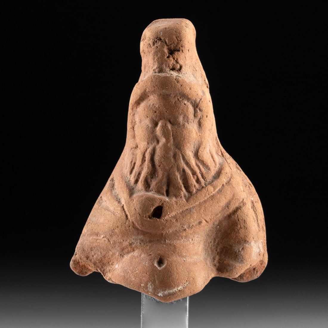 Egyptian Ptolemaic Terracotta Bes Figure - Apotropaic Household Guardian: North Africa, Egypt, Ptolemaic period, ca. 305–30 BCE. A hand-modeled terracotta figure of Bes, the leonine dwarf-god whose grotesque features were thought to repel evil. Rendered in warm reddis