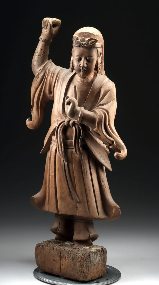 Ming Dynasty Taoist Guardian, Sword Gesture Mudra: Ca. 1500–1700 CE. East Asia, China, Ming to early Qing Dynasty, ca. 16th to 17th century CE. A finely carved wooden figure of a Taoist guardian, depicted standing atop an integral plinth and cla