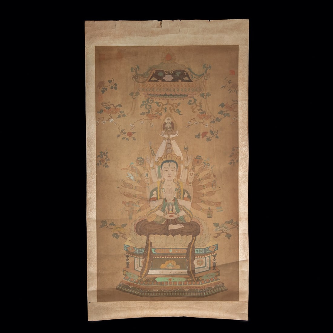 19th C. Chinese Qing Scroll Painting of Thousand-Armed Guanyin: East Asia, China, late Qing to Republic era, ca. 1850–1949 CE. A radiant vision of Qianshou Qianyan Guanshiyin Pusa, the Thousand-Armed and Thousand-Eyed Guanyin, painted in ink and mineral pigm