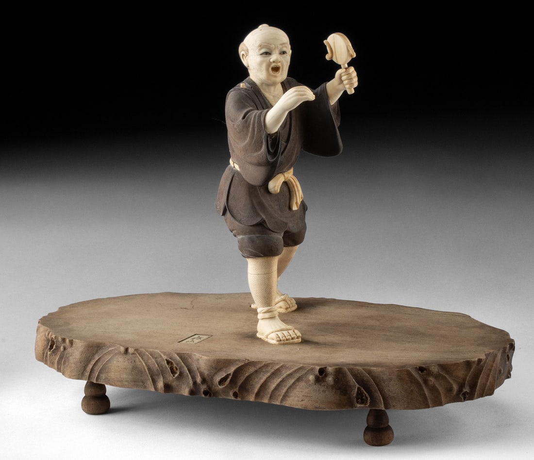 Japanese Meiji Ivory Figure - Warrior by Matsuyama: Ca. 1868–1912 CE. Matsuyama (Japanese, active late XIX century). Martial Arts Warrior. Ivory and wood okimono carving, ca. 1868 to 1912. Signed in Japanese characters on inlay on base. A lively 