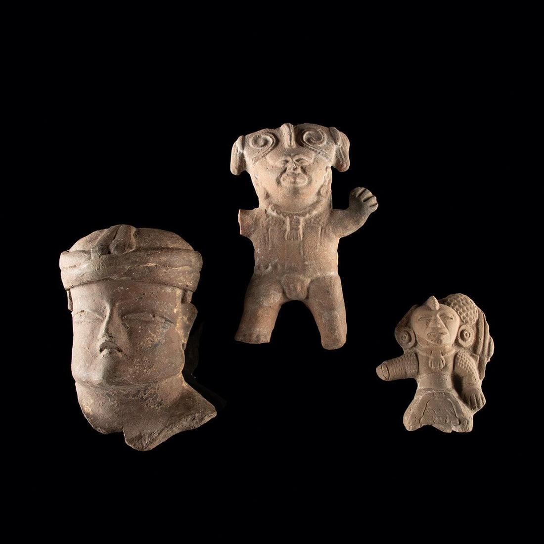 Mexico Pottery Figure Group - Tlatilco, Veracruz & Teotihuacan: Pre-Columbian, Mexico, Tlatilco, Veracruz and Teotihuacan cultures, ca. 1200 BCE – 900 CE. A group of three Pre-Columbian pottery figures from ancient Mexico. The first is a hollow Olmecoid head