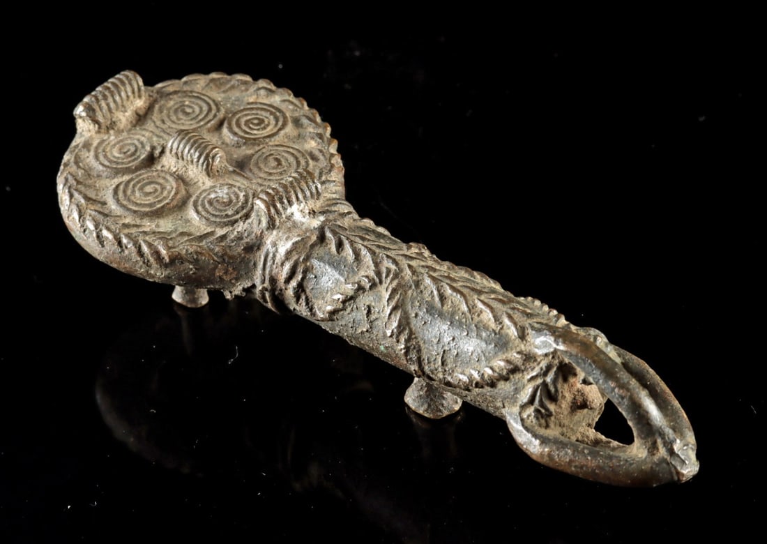 Nigerian Igbo Brass Symbolic Ofo Staff Effigy: Ca. 1934–1967 CE. West Africa, Nigeria, Igbo peoples, ca. mid to late 20th century CE. A brass object known as an ofo, a sacred symbol of truth, justice, and authority, presenting a staff-like f