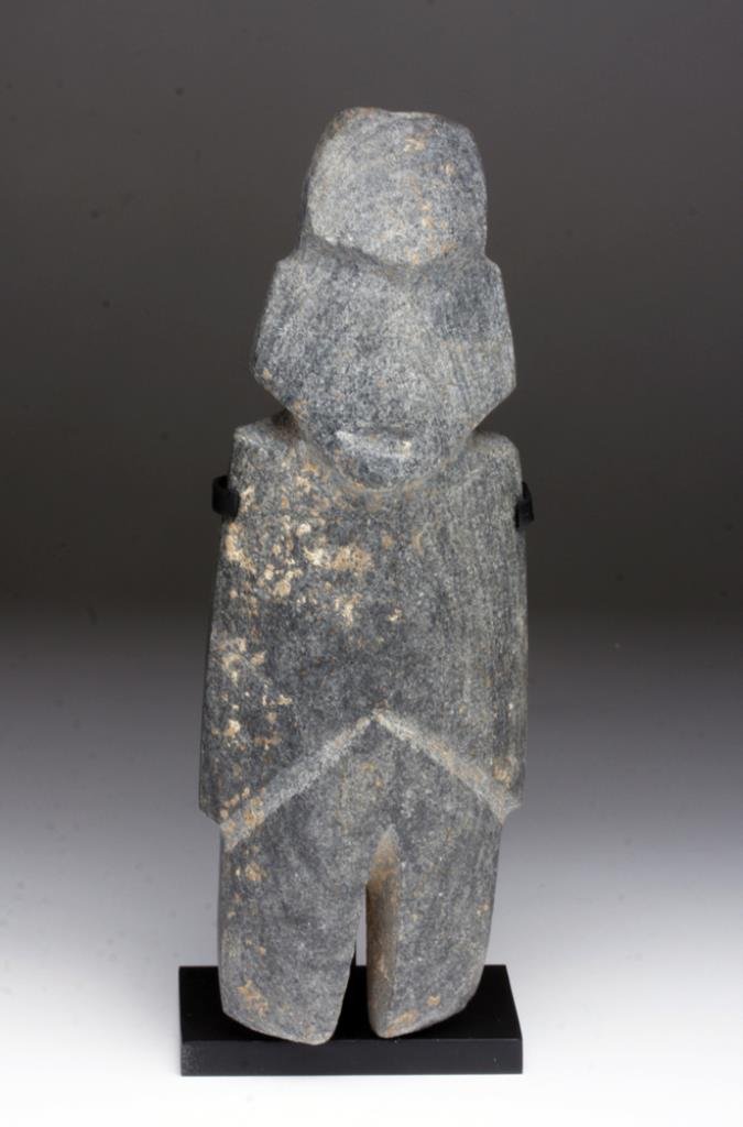 Monumental Mezcala Anthropomorphic Axe God: Guerrero, Mexico, ca. 400-100 BCE. This carved, deep gray stone - possibly fine grey andesite - standing idol has a monumental presence! The figure is depicted with elegantly simplified string-cut abs