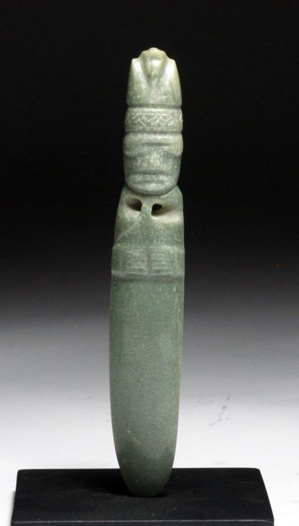 Guanacoste / Nicoya Jadeite Axe God: Guanacaste, Nicoya Region, ca. 200 to 600 CE. This exemplary work demonstrates the meticulous technique that Costa Rican sculptors demanded of themselves. This anthropomorphic axe god faces us with a 