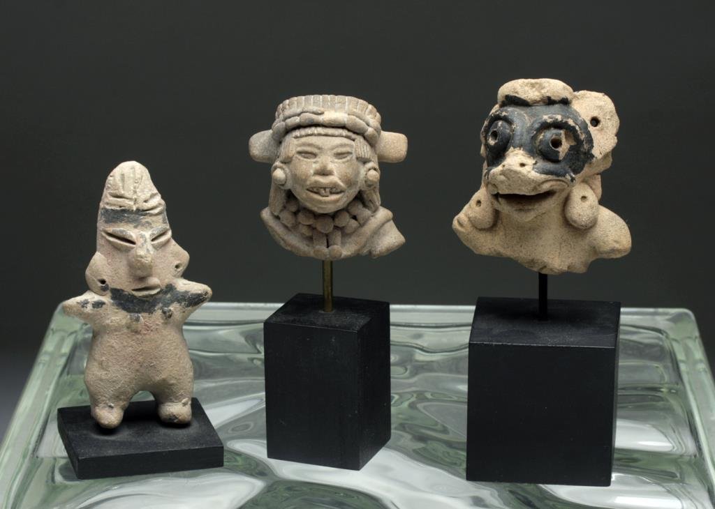 Lot of 3 Early Mexican Pottery Items + Zapotec Head: Mexico, ca. 500 to 750 CE. First, a handsome Zapotec head is expertly carved and elaborately adorned with a striated, neatly combed coiffure kept in place with a headband sporting a maize motif, finel