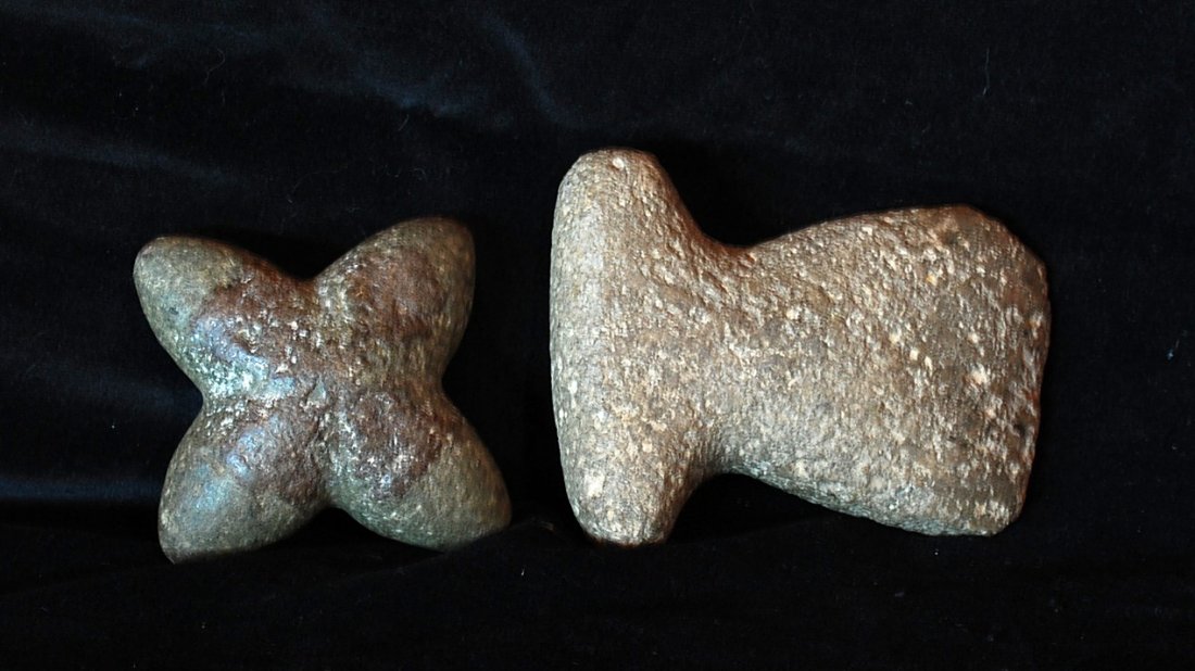 Two War Club Heads: If these weapons could talk, what narratives would they impart? These war club heads of the ancient Peruvians - either Inca or perhaps an earlier culture, signify the militaristic nature of Incan mona