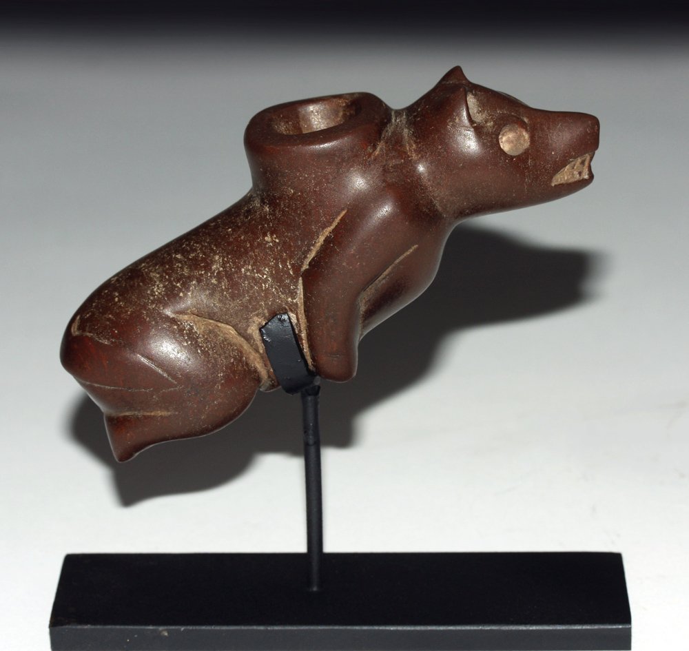 Catlinite Flying Bear Peace Pipe: Upper Midwest and Eastern Plains, North America. ca. 1400-1750. This bear peace pipe is crafted from Catlinite, a soft, red siltstone, named for the artist and explorer George Catlin who visited the q