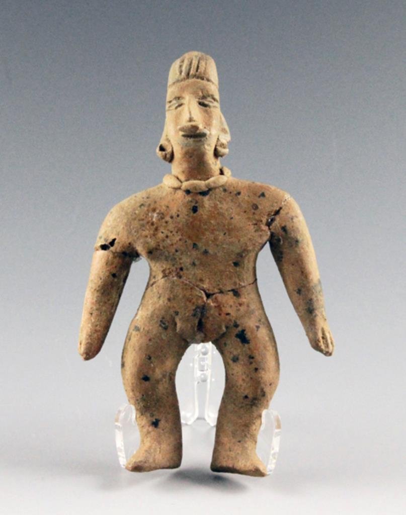 Colima Female Figure, Pre-Columbian West Mexico: From the ancient Colima region of Pre-Columbian West Mexico, circa 200 BCE / 200 CE. This example measures approximately 4" tall, and depicts a female. She is shown wearing a large beaded necklace, ea