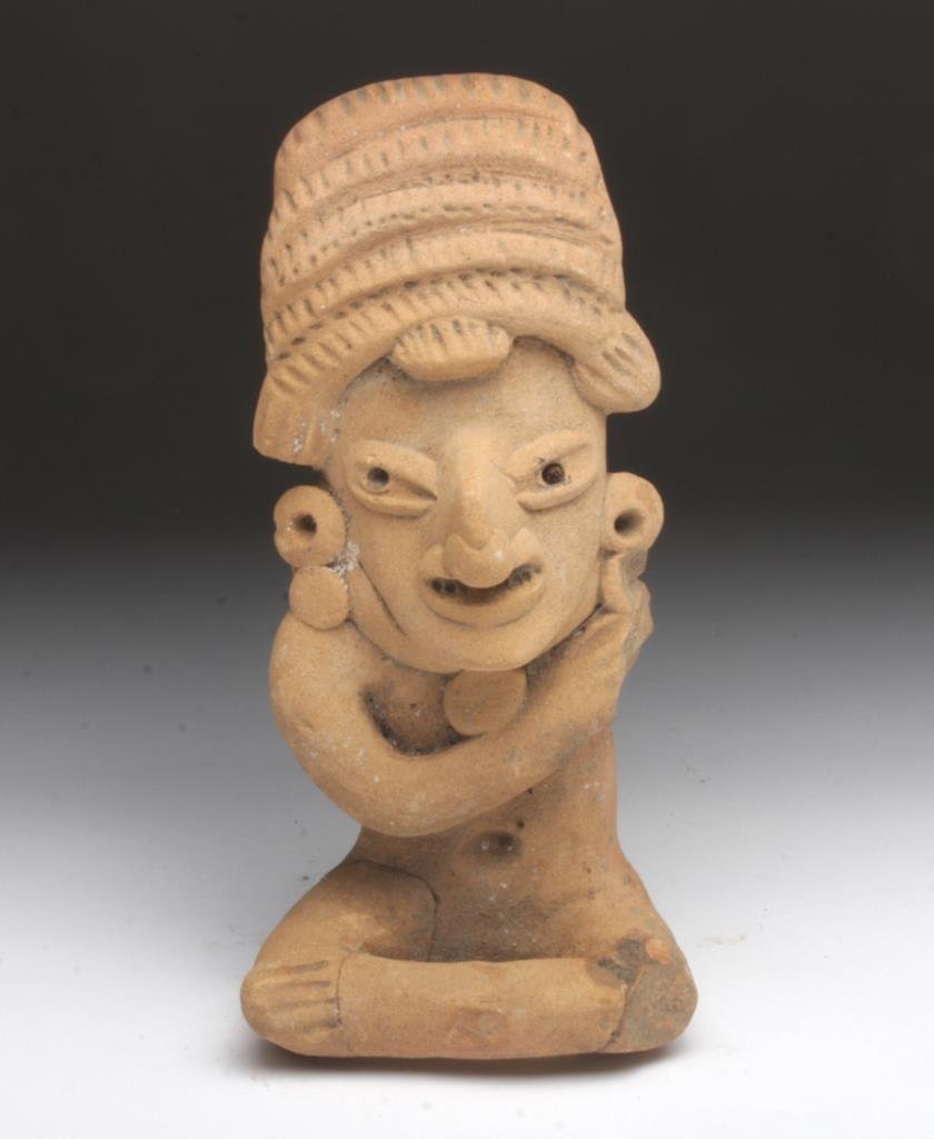 Veracruz Figure / Coast Watcher #1: Mexico, Veracruz, Classic Period, ca. 450-650 CE. According to indigenous legend, figures of this type were said to have been placed along the shoreline to watch for invaders; hence the name "coast wa