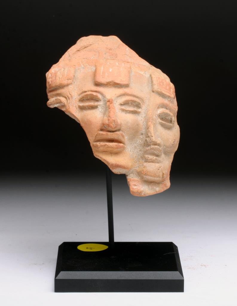 Pre-Columbian Toltec Mask Fragment: Central Mexico, Toltec ca. 800-1000 CE. The ancients of the Americas understood the duality of life -- that destruction could also open the door to a better future, that violence in the form of bloody