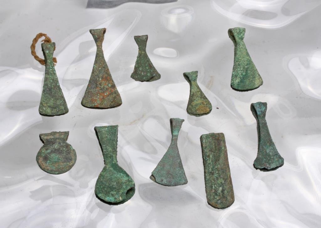 Lot of 10 Ancient Pre-Columbian Copper Tweezers: Peruvian, likely Inca, ca. 1000-1500 CE. Group of ten copper tweezers of various shapes and sizes. Gorgeous patina. Range in size from 1" to 2" long. Perfect accent pieces for necklaces / jewelry-maki