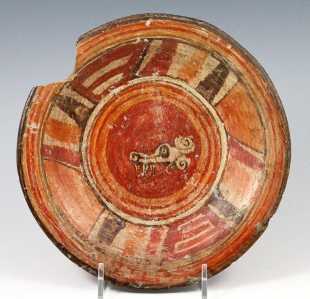 Pre-Columbian Mixtec Polychrome Plate, Rare Type: From ancient Mexico, circa 1000 - 1500 CE. Measures approximately 7" in diameter. Includes display stand, as shown. This plate is in the form of a shallow dish, profusely decorated in typical Mixtec p