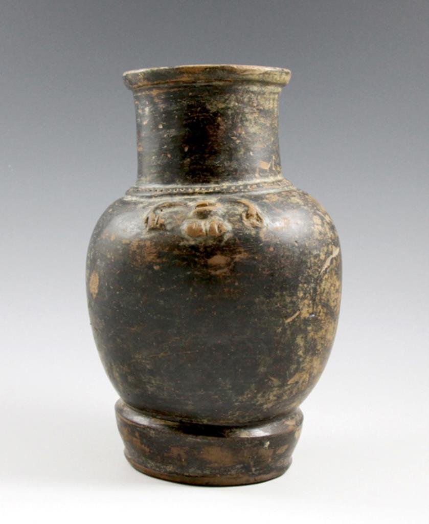 Tairona Blackware Vessel, Pre-Columbian Colombia: Pre-Columbian Colombia, circa 1000 - 1550 CE. This example measures approximately 8" tall, and represents a vessel with a bulbous body and a narrow neck, finished in black- typical for most Tairona wa