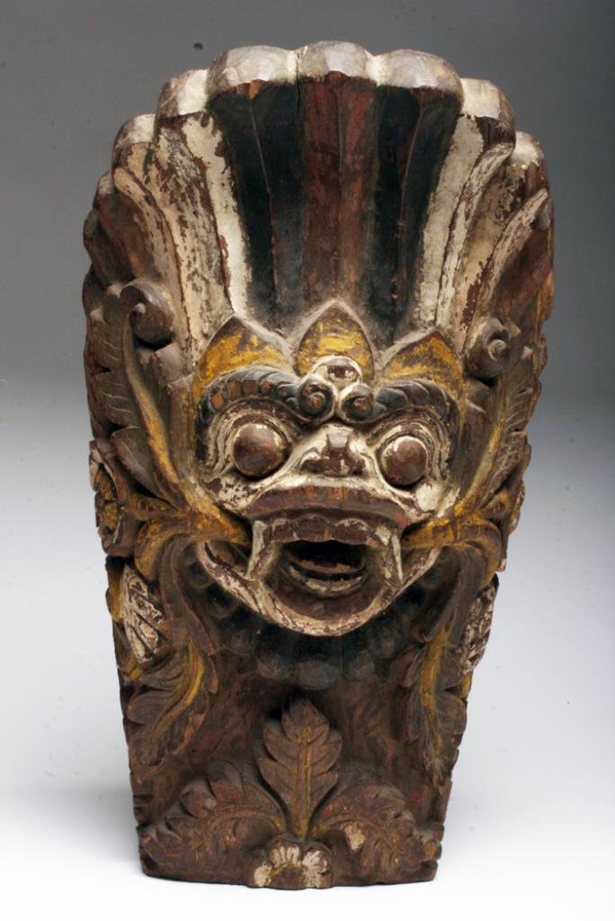 Antique Balinese Carved Wood Barong Figure: Bali, Indonesia, ca. 1900 CE. A carved wooden Barong figure, probably a wall mount, from Bali. Barong is the king of spirits and leader of the "hosts of the good" in Balinese mythology. He is often ch