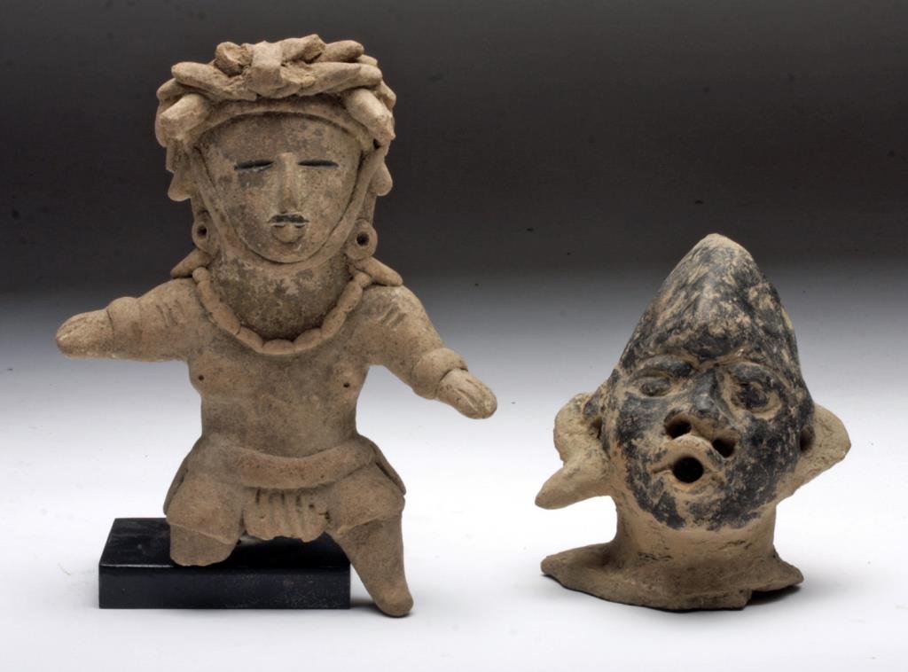 Lot of 2 Veracruz Artifacts: Head + Male Figure: Pre-Columbian, Mexico, Vera Cruz, ca. 450-650 CE. Lot includes a large terracotta head, once part of a larger figure, that possesses a rather threatening countenance with his flaring nostrils, open ho