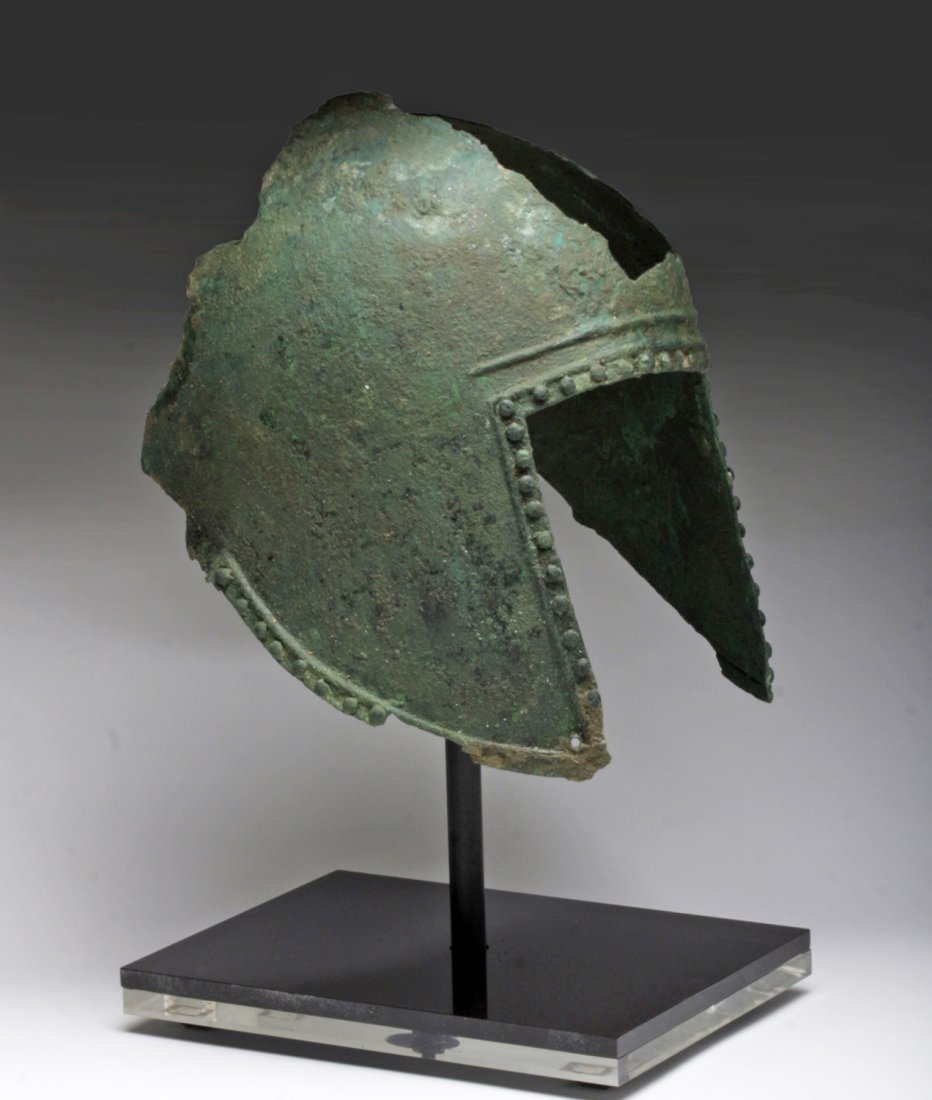 Greek Illyrian Bronze Helmet: Southwestern Greece, 7th to 6th century BCE. One of the most striking and important developments of ancient warfare was the bronze helmet. This style dates back to the 8th century BCE and it is though