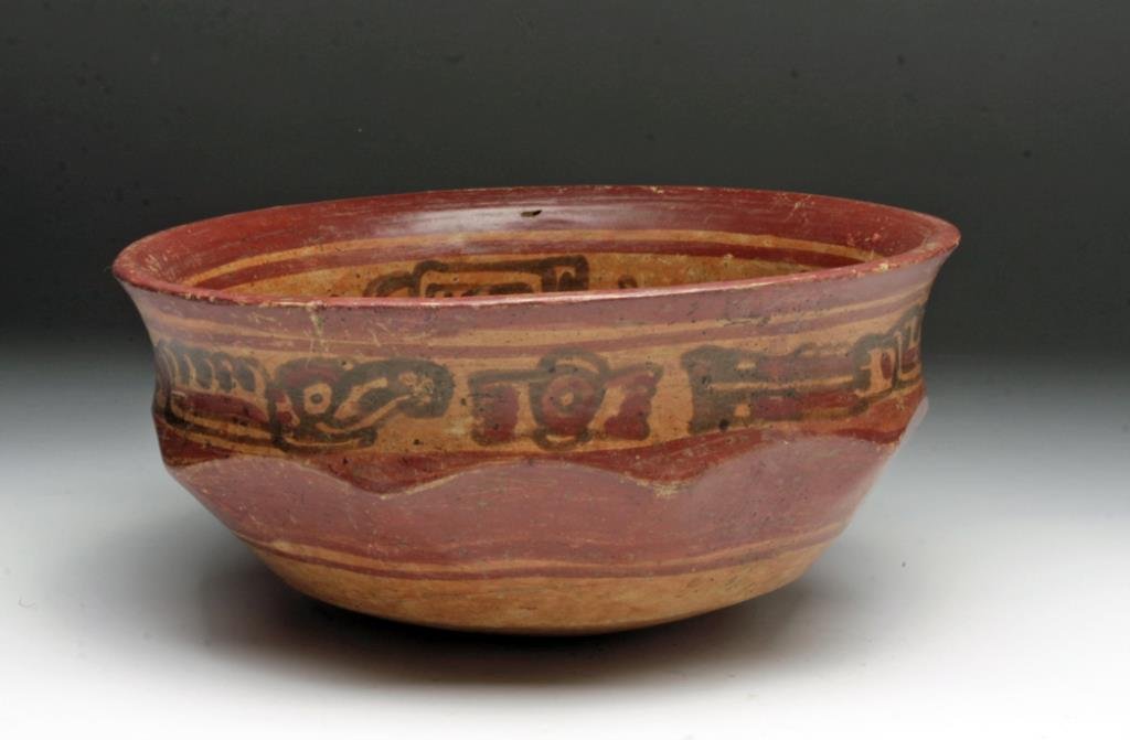 Mayan Copador Bowl - Quetzalcoatl Images: Pre-Columbian, El Salvador / Honduras, Mayan, ca. 550-900 CE, Late Classic. The exterior of this iconographically rich Mayan Copador bowl features three lively representations of Quetzalcoatl, the inf