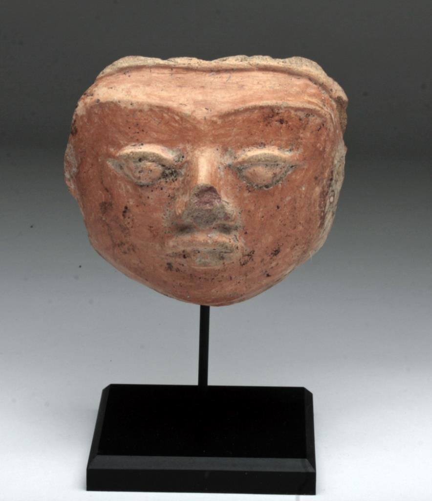 Face of Young Mayan God: Mexico, Yucatan peninsula, Maya culture. Late Classic, ca. 600-900 CE. This visage resembles the likenesses on the life-size stucco heads that presumably fell from the facades of Mayan architecture th
