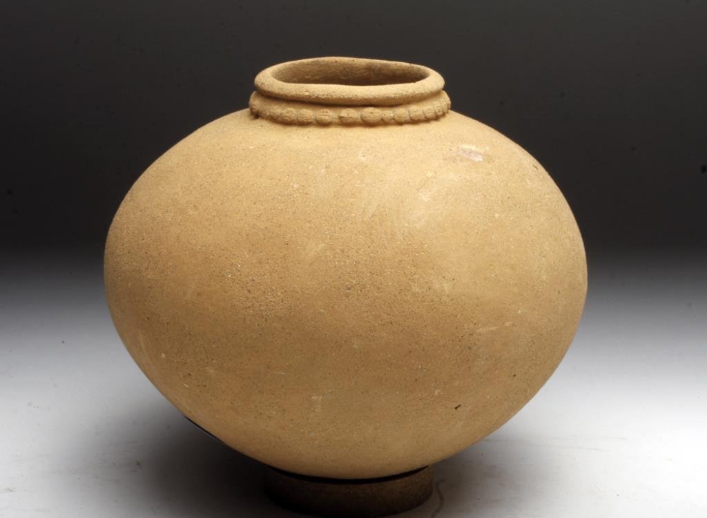 Tarrago Creamware Olla #2: Pre-Columbian, Border area between Panama & Costa Rica (Diquis zone), Tarrago, Chiriquí Phase, Period VI, ca. 1000-1500 CE. This simple yet elegant earthenware jar represents early pottery created in