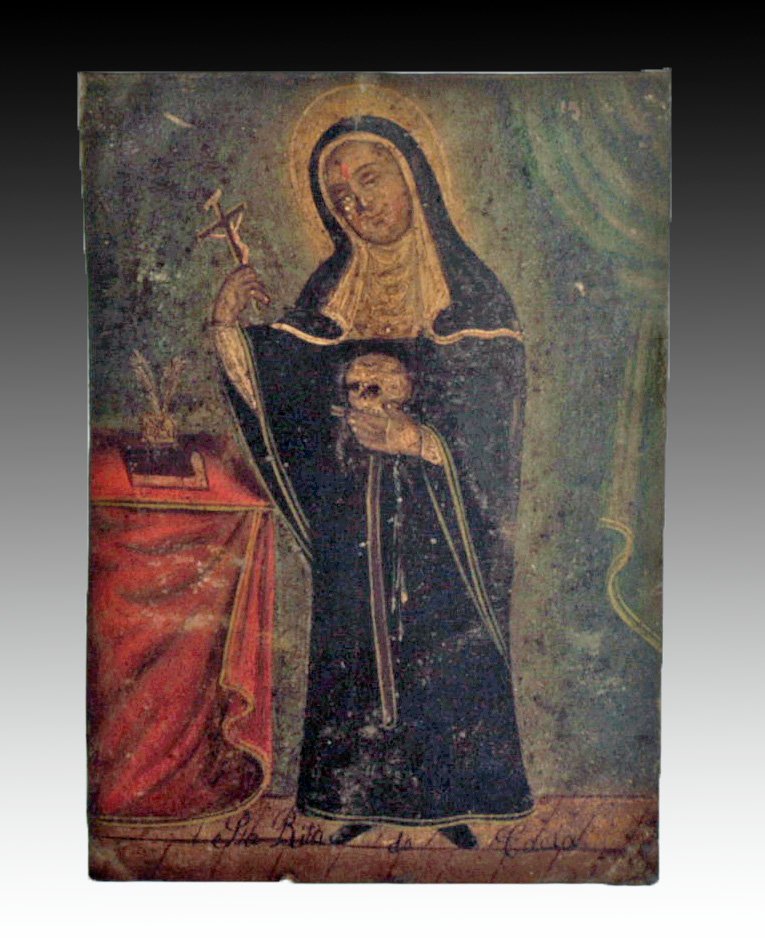 Antique Mexican Retablo - St. Rita de Cascia: Mexico, ca. 1800-1900. An interesting antique Mexican retablo depicting St. Rita of Cascia. Icons like these were placed above household altars to venerate the saints (retablo literally means "behind 