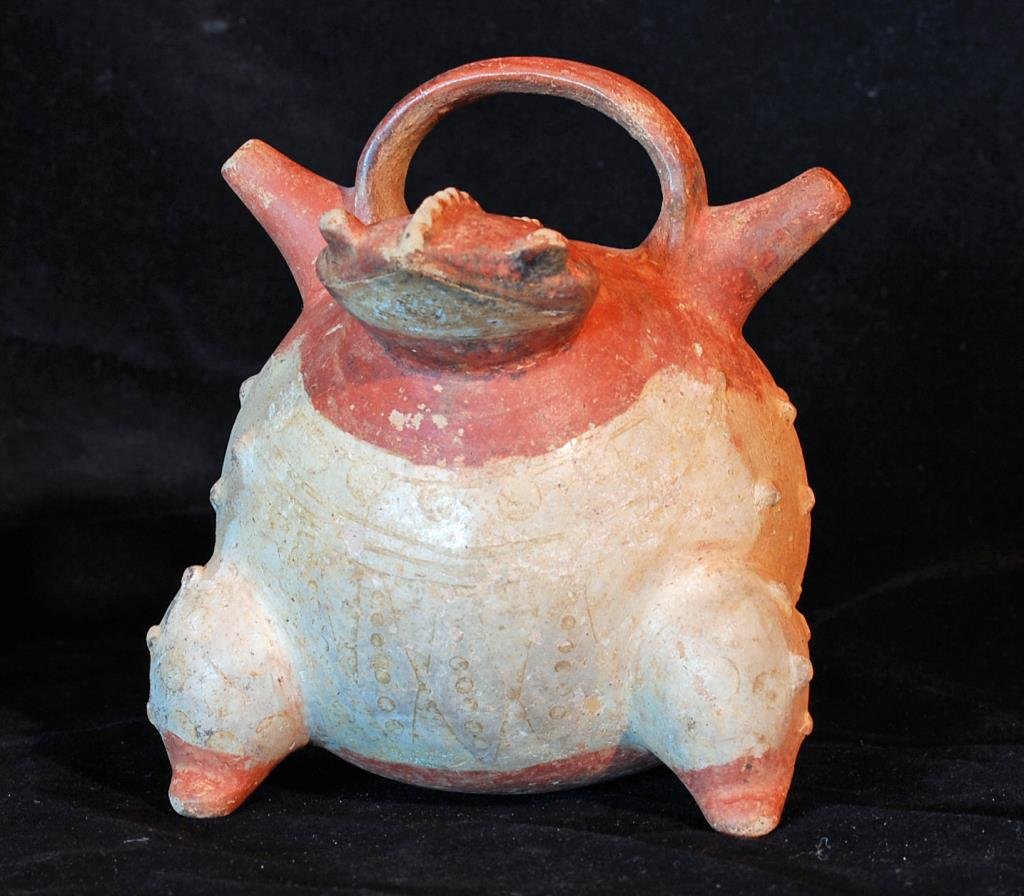 Calima Alcarraza Toad Effigy Jar: Pre-Columbian, Calima Culture, Colombia, ca. 300-1250 CE. Terracotta vessel with traces of resist paint design on the chest. 5.5" tall x 5" wide. Provenance: Ex private Tampa FL collection. All items 