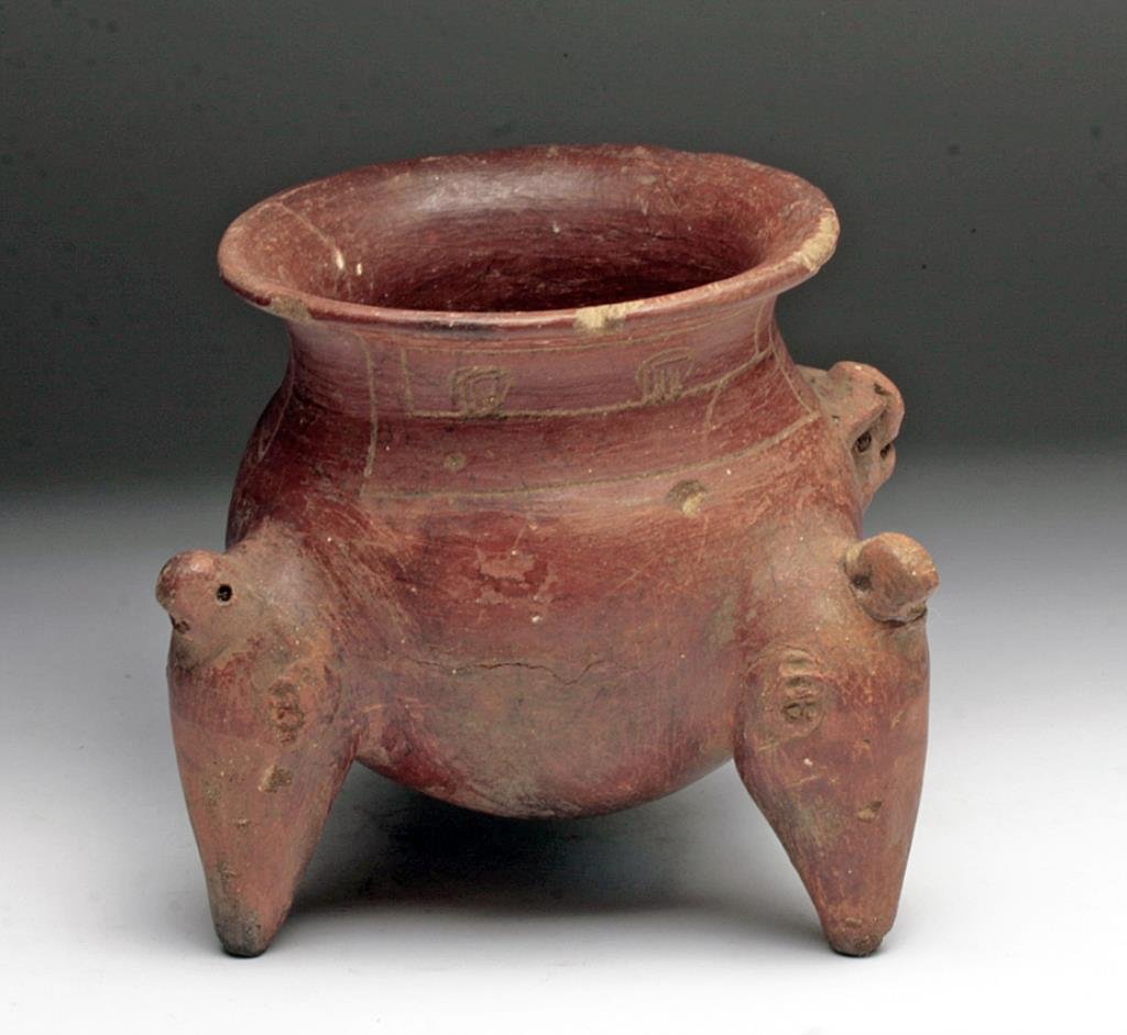 Costa Rican Redware Rattle Bowl: Pre-Columbian, Central America, Costa Rica, Period IV, La Selva from Atlantic Watershed region, ca. 400 to 700 CE. Each leg of this beautiful tripod vessel assumes the form of a bird with feathers hig