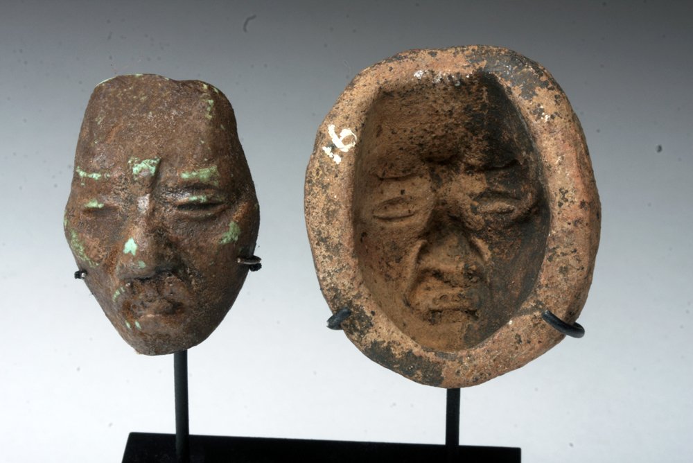 Maya Terracotta Figural Mask Mold: Pre-Columbian, Mayan territories, Ca 550 to 800 CE. Pottery mask mold, created in the form of a monkey's head. With the head is an example of a mask created by the mold - not ancient. Mold is 1-1/2" H