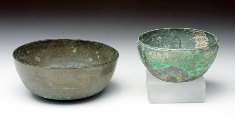 Lot of 2 Khmer Bronze Bowls (Cambodia): Cambodia, Khmer Empire, ca. 12th - 14th century CE. Two small bronzes bowls bronze bowl, beautifully formed, with a nice patina throughout. 2 1/2" x 1 1/2" & 3 1/2" x 1 1/2" Provenance: ex-D. Smith, S