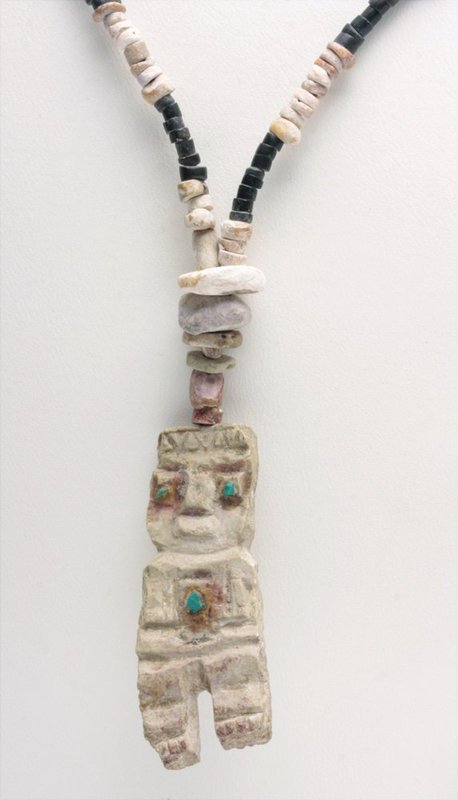 Chimu / Inca Necklace with Figural Pendant: Pre-Columbian, Northern Peru, Chimu/Inca, pre-15th Century CE, with contemporary assembly. The highlight of this necklace is the figural pendant that tellingly features turquoise eyes and a turquoise 
