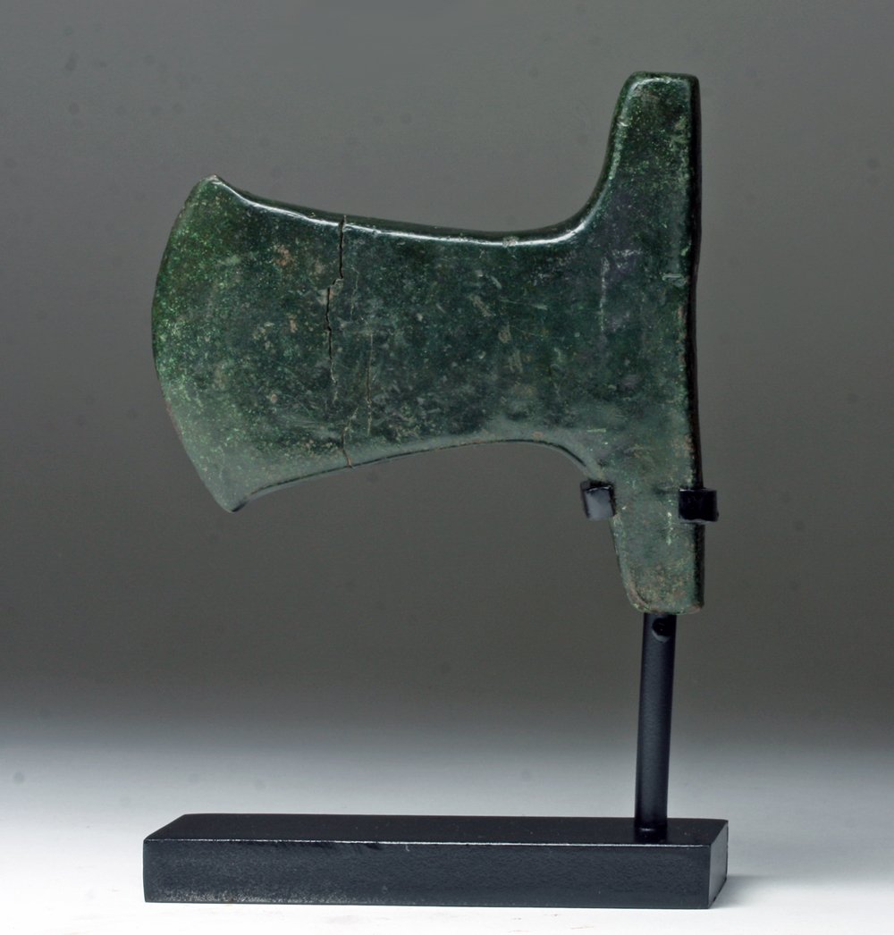 Inca Copper Axe - Superb Patina: Pre-Columbian, Central Peruvian Highlands, Ca 1400 CE. Copper ax with large flange for attachment and slightly flared blade. This was probably used for chiseling stone and in the course of its usage i