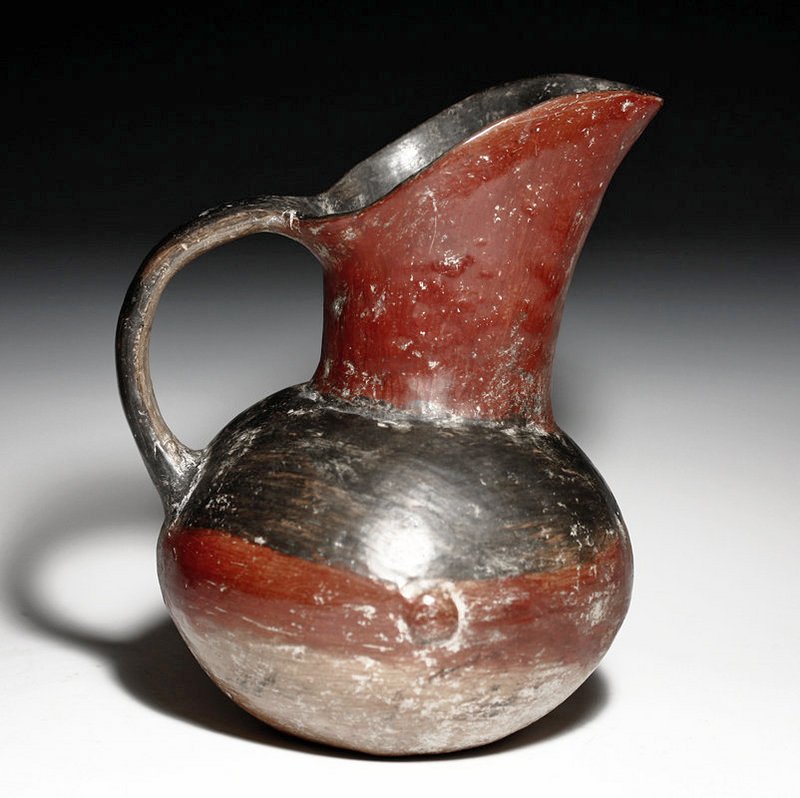 Pre-Columbian Aztec Bi-Chrome Pitcher: Mexico City region, Ca 1450 to 1500 CE. Some of the hardest Pre-Columbian pottery to find - because the Spanish did such a fabulous job of destroying it! Terracotta pouring vessel painted red and blac