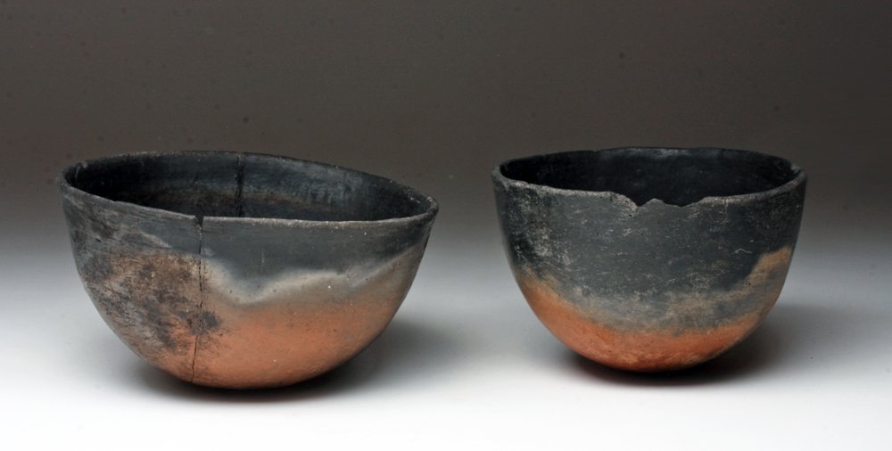 Lot of 2 Native American Mogollon Pottery Bowls: West central New Mexico, Ca 1200 to 1350 CE. Pair of utilitarian bowls, each with red base clay with heavy black and gray firing clouds producing a most attractive surface. 6-1/4" D for largest. Prove
