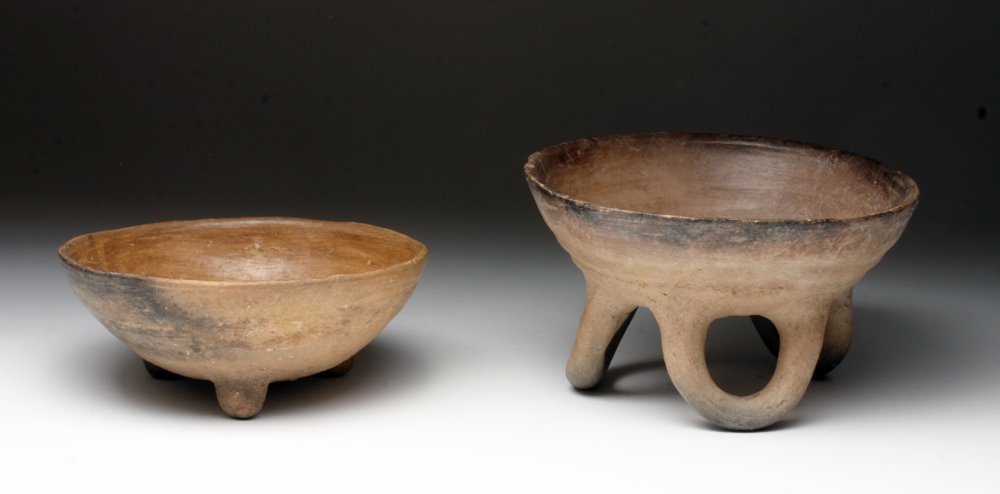 Lot of 2 Michoacan Molcajete Grinding Bowls: Pre-Columbian, Western Mexico, Ca 1000 to 1500 CE. Pair of brownware pottery bowls, each with tripod feet and each with deeply incised patterns to facilitate grinding in the center. First bowl with la