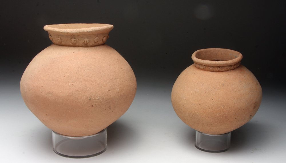 Lot of 2 Pre-Columbian Tarrago Creamware Ollas: Pre-Columbian, Border area between Panama and Costa Rica (Diquis zone), Tarrago, Chiriqui Phase, Period VI, ca. 1000-1500 CE. This pair of simple yet elegant earthenware jars represents early pottery