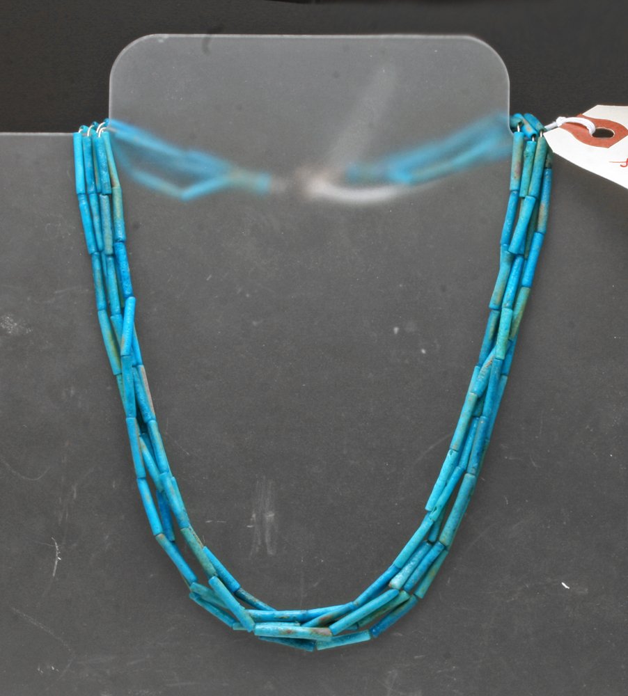 Egyptian Amarna Period Faience Necklace: Egypt, Amarna Period, 18th Dynasty, ca. 1353â€“1336 BCE. A beautiful faience wristlet or necklace from Egypt's high period in Faience art. Composed of 5 strands of deep blue faience tube beads, a