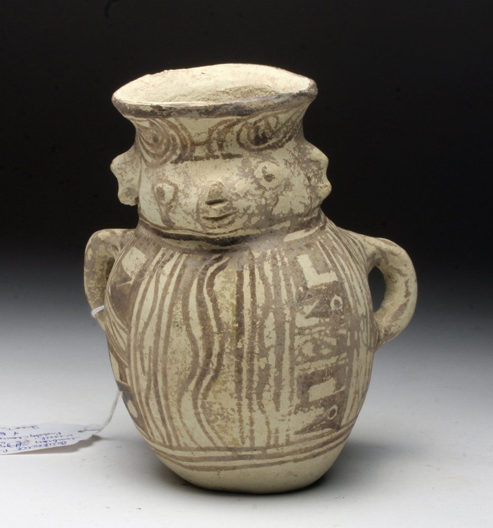 Veracruz Twin-handled Figural Amphora: Mexico, Vera Cruz, Gulf Coast, Huastec culture, ca. 1200-1400 CE. This twin-handled amphora assumes the form of an anthropomorphosed creature with lively facial features and a body painted with elabor