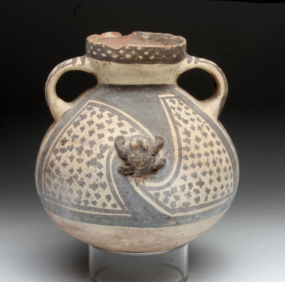 Delightful Chancay Olla with Frogs: Pre-Columbian, north Peru, CA 900 to 1200 CE. Love Chancay! A very sweet medium-sized olla decorated on each side with applied frog sitting in winding pattern of stars and swirls, two small strap hand