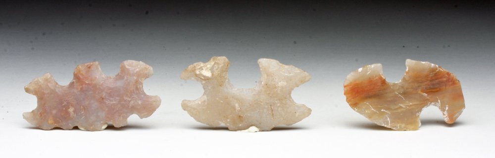 Lot of 3 Mayan Eccentric Flints: Pre-Columbian, Mayan territories, Ca 400 to 700 CE. Set of three wonderfully knapped flint creatures, often found in Mayan cenotes throughout the Mayan lands. Included are a Mayan lord in dance pose, 