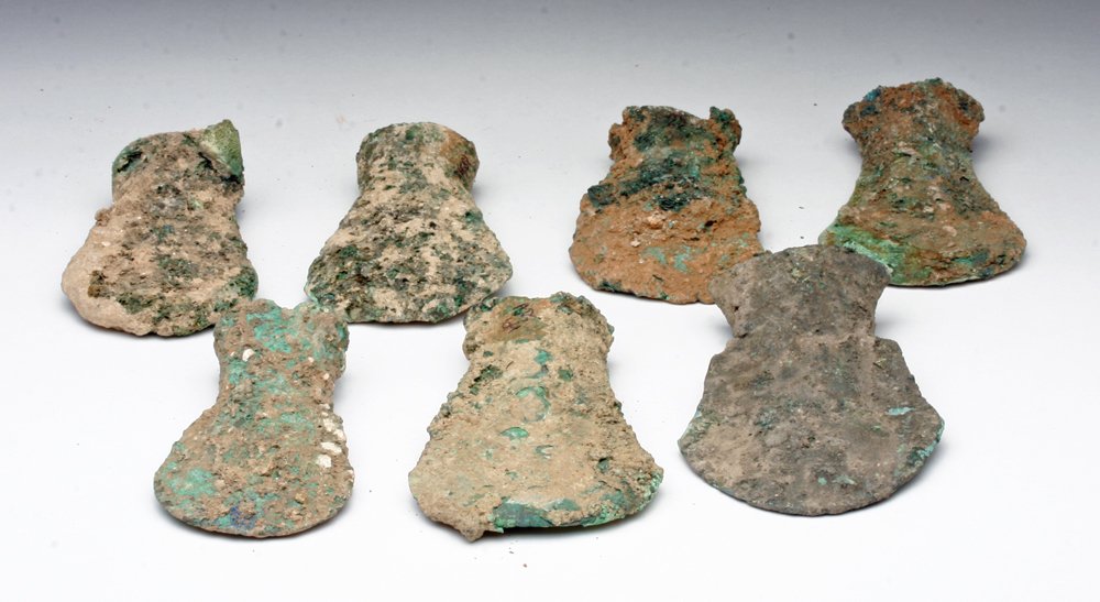 Lot of 7 Vietnamese Dong Son Bronze Axe Heads: Vietnam, Dong Son Culture, 1st millennium BCE. A group of seven early bronze axe heads with socketed bases and wide blades. 3-1/2" to 4"L. Provenance: Ex-Smith Collection, CA. All items legal to buy/s