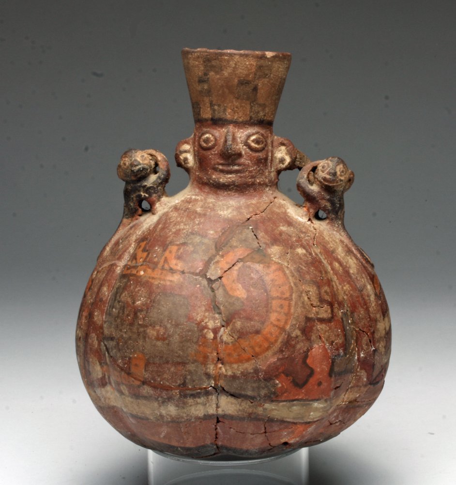 Wari Effigy Jar with Human / Monkeys, ex-Farwell: Pre-Columbian, Peru, Central Coast, Wari Santa Clara culture, ca. 650CE - 850CE. The Wari developed one of the biggest states on the Andes preceding the Inca. This vessel is impressive for its overall